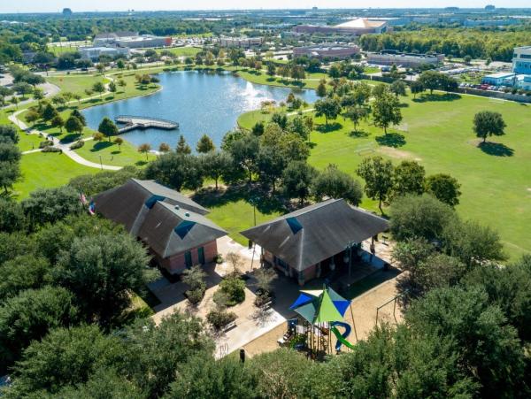 Aerial view of playground and pond at Eldridge Park in Sugar Land, TX.