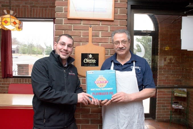 Zach Brown (l), VFTCB Online Marketing/Research Manager, presents last year’s winner, Pete Chiaro, with his marketing kit, one of 64 that went to the participating pizzarias countywide. Online voting for the 2017 Montco’s Best Pizza Tournament at valleyforge.org ends April 2.