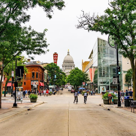 A view of State Street with the Wisconsin State Capitol in the background
