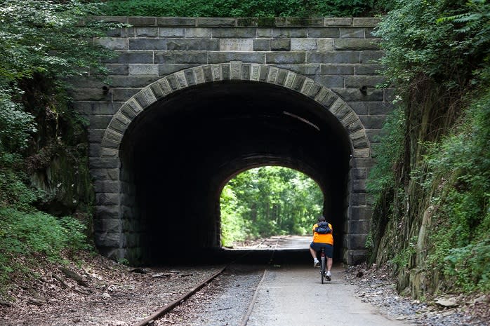 Man Biking Through The 370-foot Howard Tunnel in York, PA