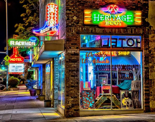 Heritage Boot exterior with neon signs and lights