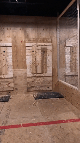 Person Throwing Axe At Civil Axe