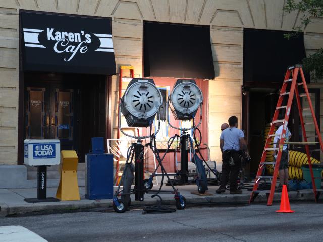 Film crew outside set of Karen's Cafe