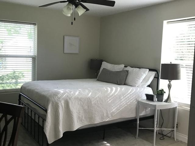 Light and bright master bedroom has a queen bed. Full bed in guest bedroom.