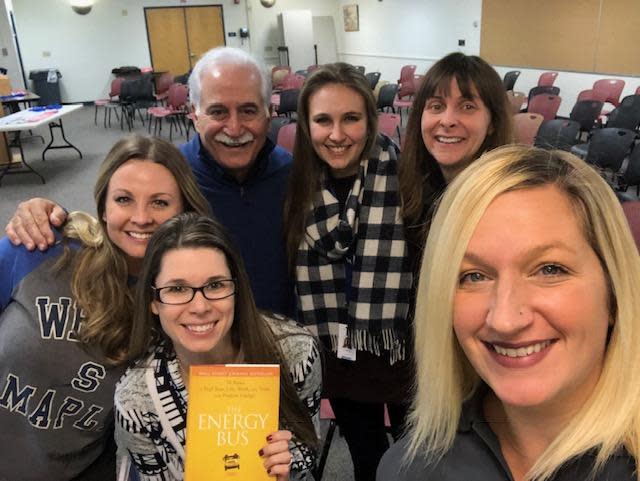 Rich Johns with a group of teachers