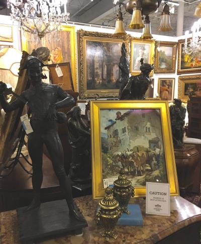 Gilded frames, chandeliers and statues inside Grandview Mercantile antique store