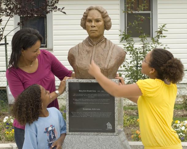 family looking at monument