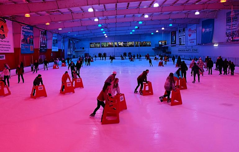 Crowd of ice skaters at Bill Gray's Regional Iceplex