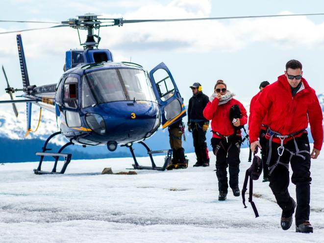 Guests walking from heli