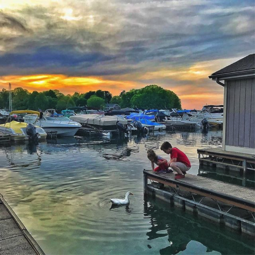 Children playing on the docks near Hello Sailor