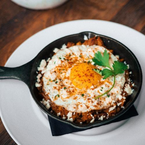 Eggs in a cast iron pan at Table 33 in Dayton, OH