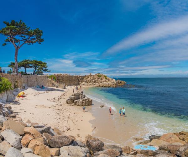 Visitors enjoy the beauty of Lovers Point Park located Pacific Grove, California.