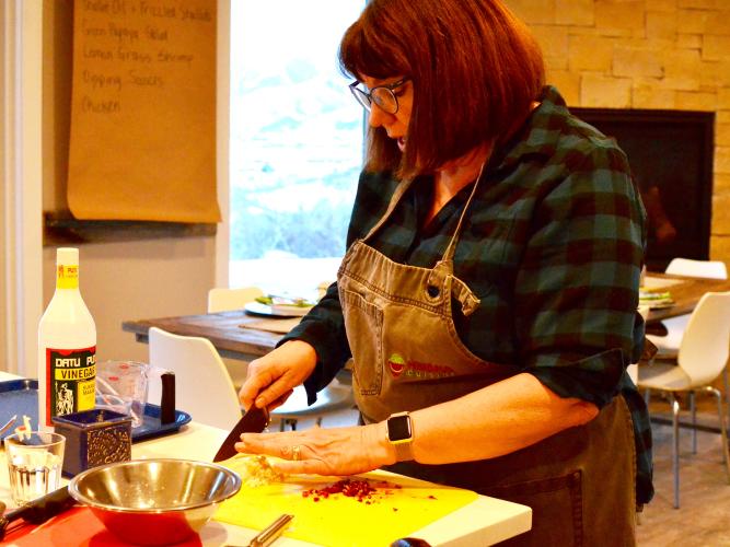 Chef Linda chopping vegetables