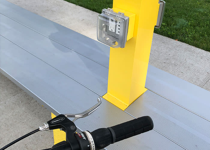 Erie Lackawanna Trail yellow phone charger station and bench