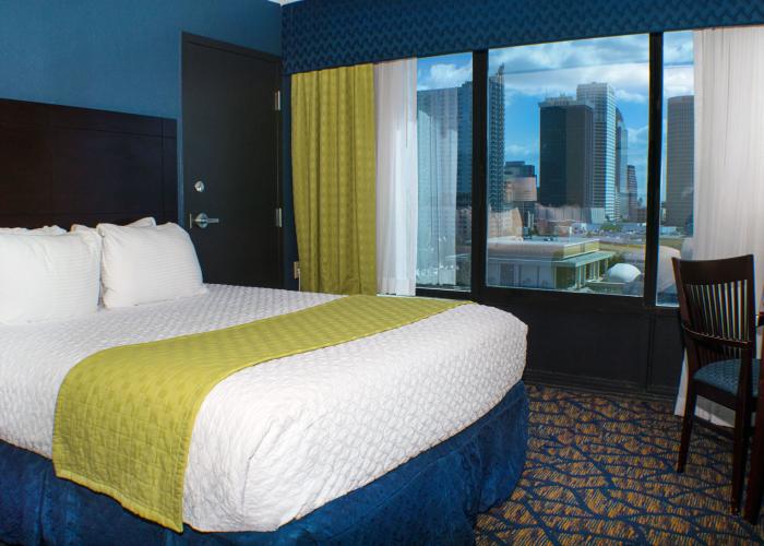 Guest room with city skyline view