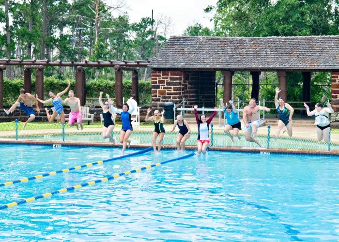 Kids Jumping Into Swimming Pool