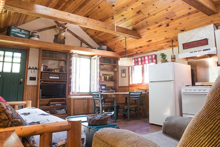 Hideaway Resort Cabin Living Room - Chippewa Falls, WI