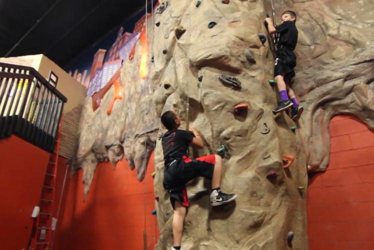 Action City Trampoline Park & Fun Center climbing wall