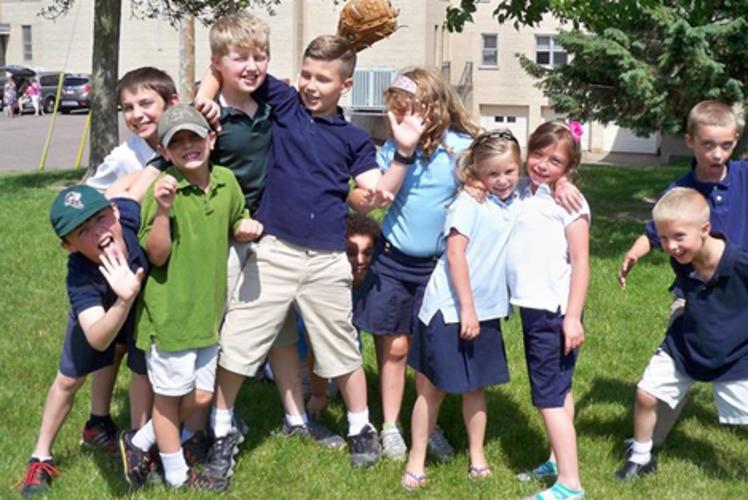 school kids having fun at St. James The Greater Church in Eau claire, WI