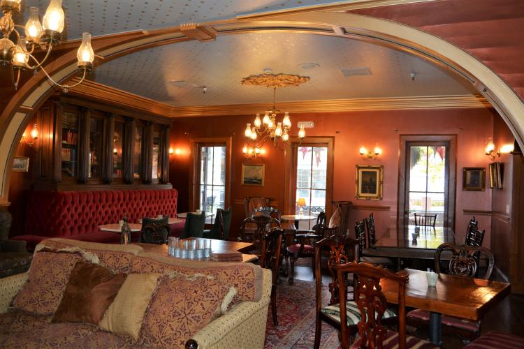 Inn at Saratoga front room 2nd shot with arched woodwork