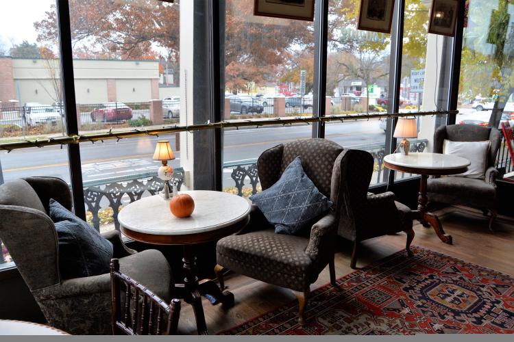 Saratoga Arms bar area with tables by the windows