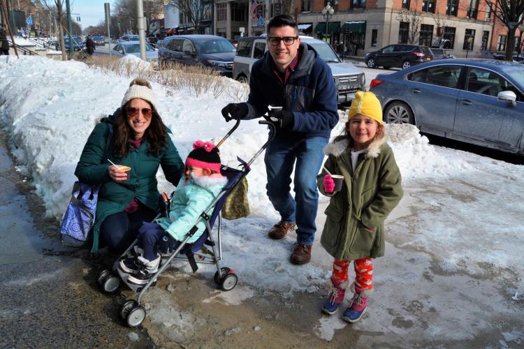 Family on sidewalk