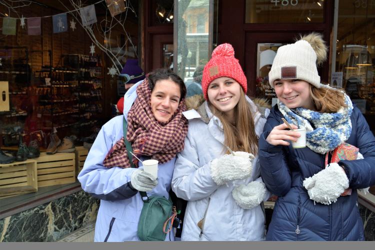 Three girls holding chowder
