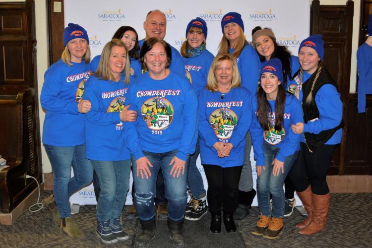 Group shot of the Discover Saratoga team wearing blue Chowderfest shirts