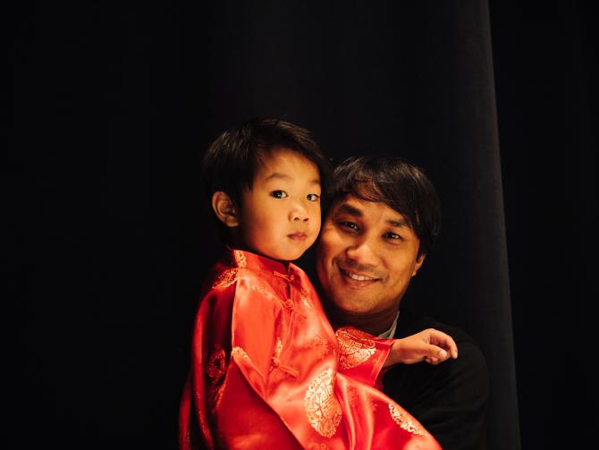 Father and son prepare for performance at Wichita Asian Festival in Wichita KS