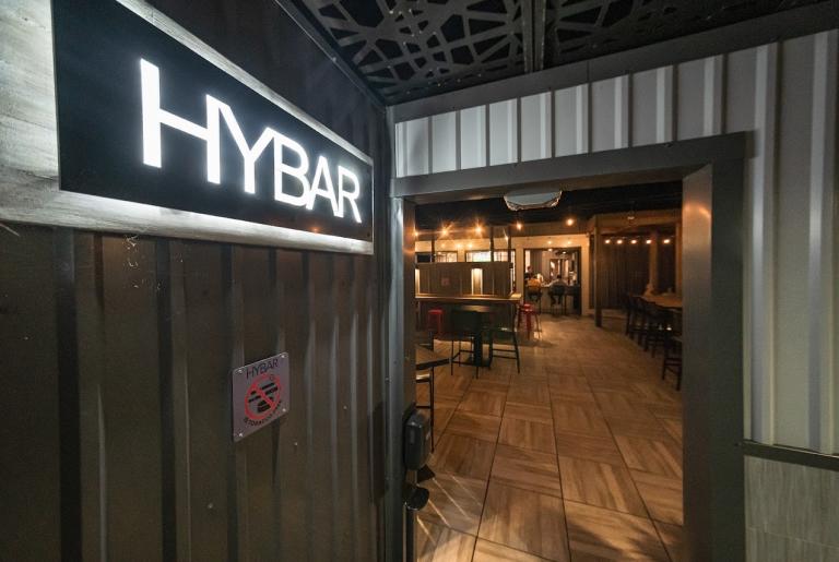 Hybar Athens sign rooftop