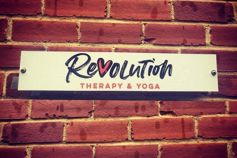 Revolution Therapy and Yoga logo