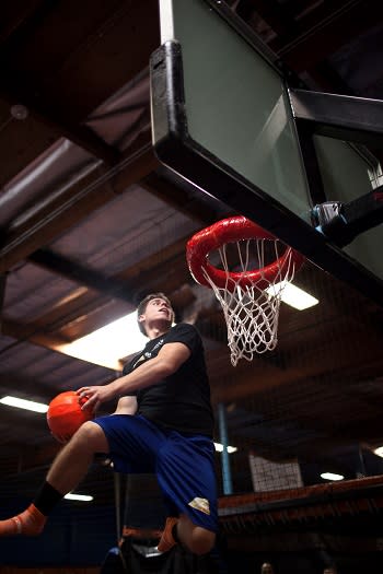 Sky Zone dunking basketball