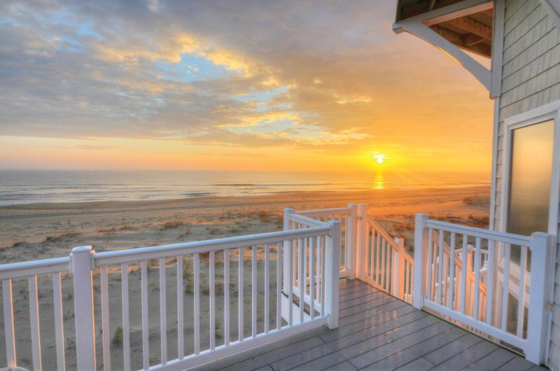 Sandbridge Sunrise outside off of the deck of a house