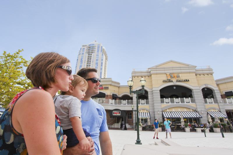 Family Posing in Front of the Town Center in Virginia Beach