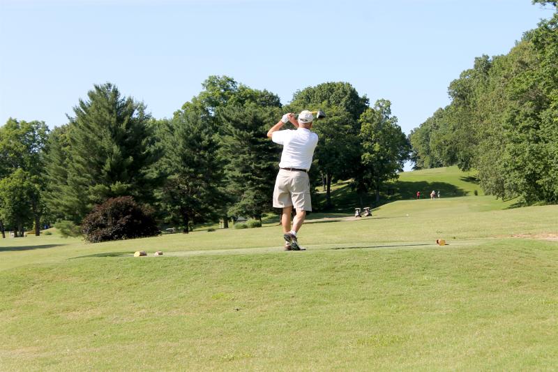 golfer at Swan Lake