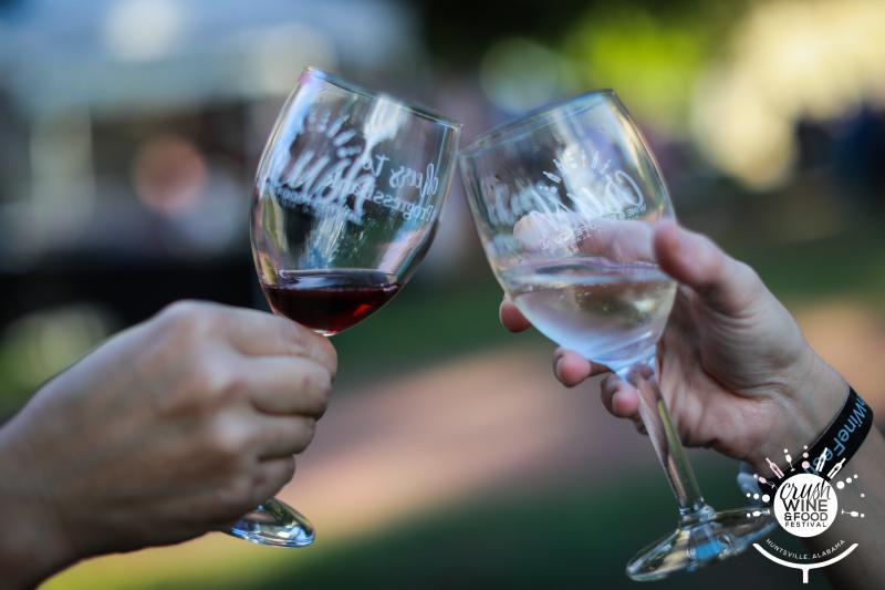 Wine Glasses toasting at Huntsville Crush Wine and Food Festival