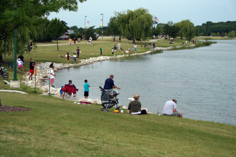 Lake Andrea People Fishing Along Shore