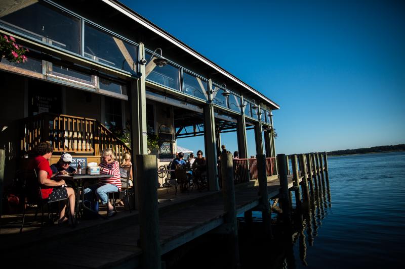 People eating on the Deck of The Back Deck