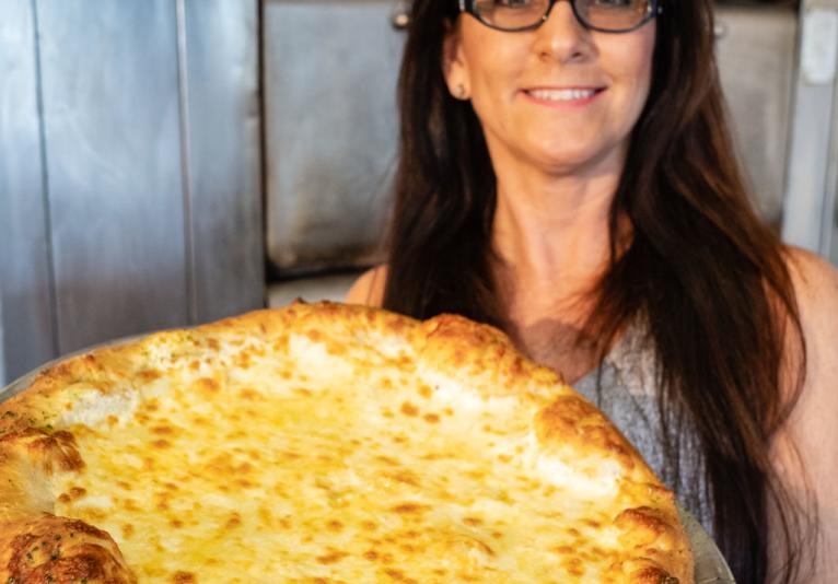 Try one of our Specialty Pizzas- White Pizza is my personal favorite