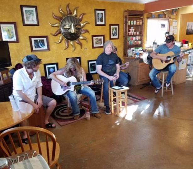 Band playing in bright cafe