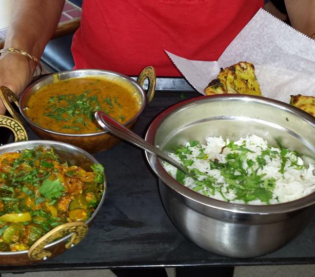 Vegetable korma with rice and spiced lentils