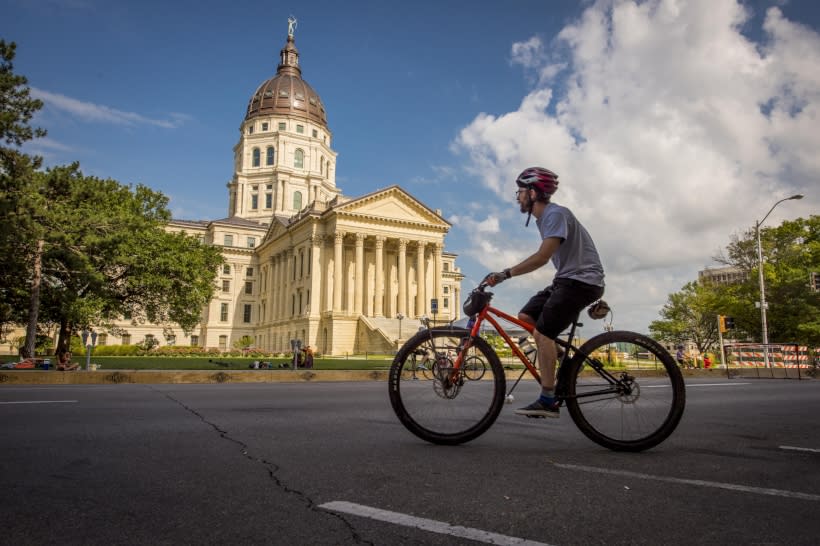 Copy of Guy on Bike in front of Capitol