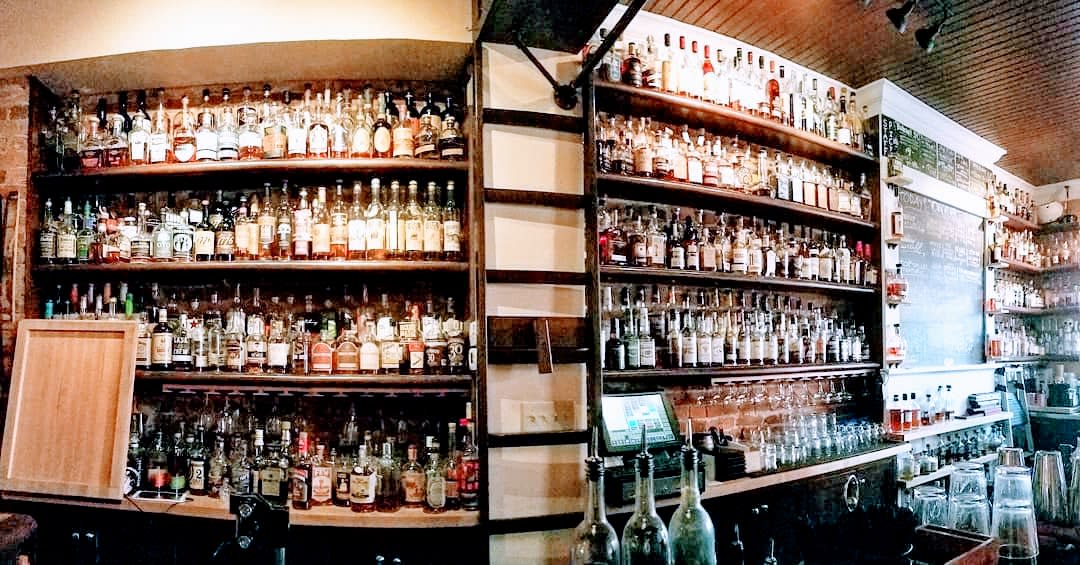 More than one hundred bourbons on the shelves of Old Kentucky Bourbon Bar