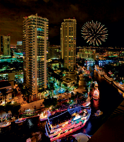 Fort Lauderdale's 50-year-old Winterfest Boat Parade features a lights, decorations, music, performers, and illuminated watercraft on the New River.