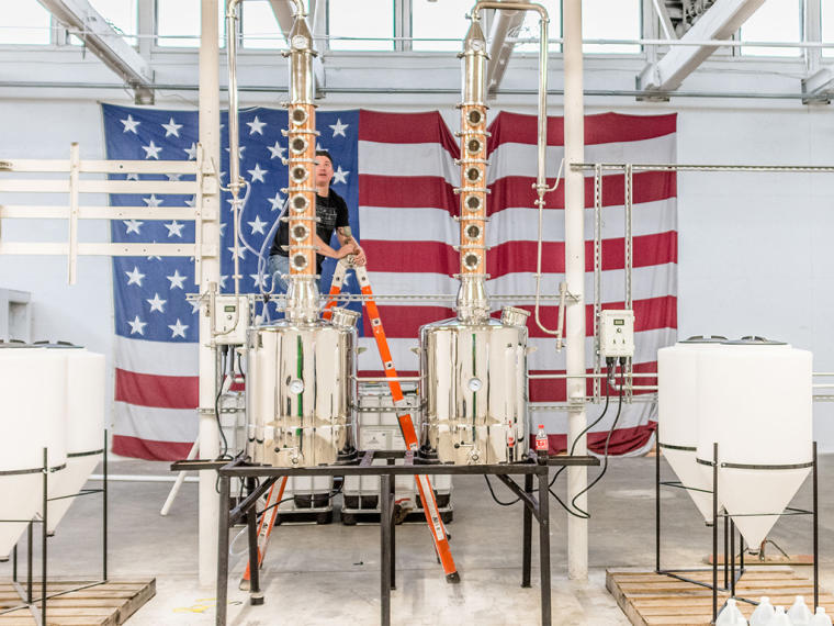 American flag and the still at InStill Distillery in Clayton, NC.