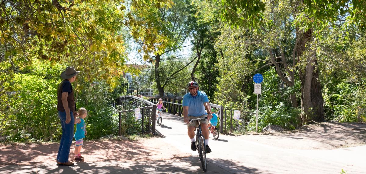 Families biking and walking on Boulder Creek Path