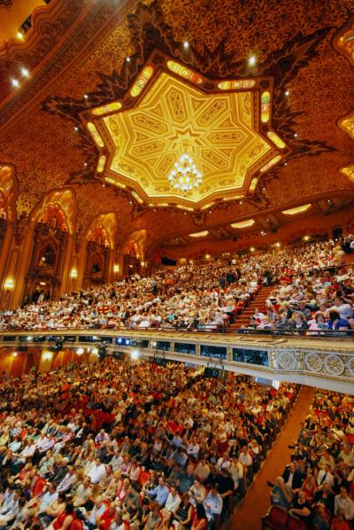 View of packed audience sitting inside the stunning, highly embellished Ohio Theatre