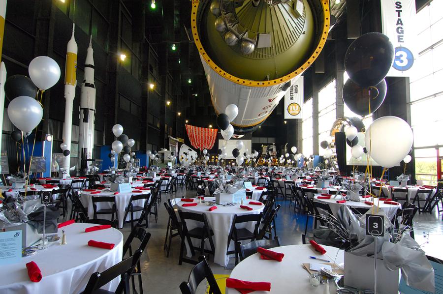 Space and Rocket Center Meeting Room With Balloons and Round Tables 