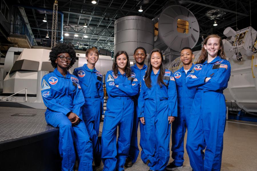 Group Of Kids In Astronaut Uniforms At Space Camp