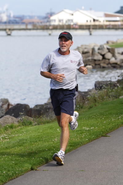 Man Running along Ruston Way Waterfront